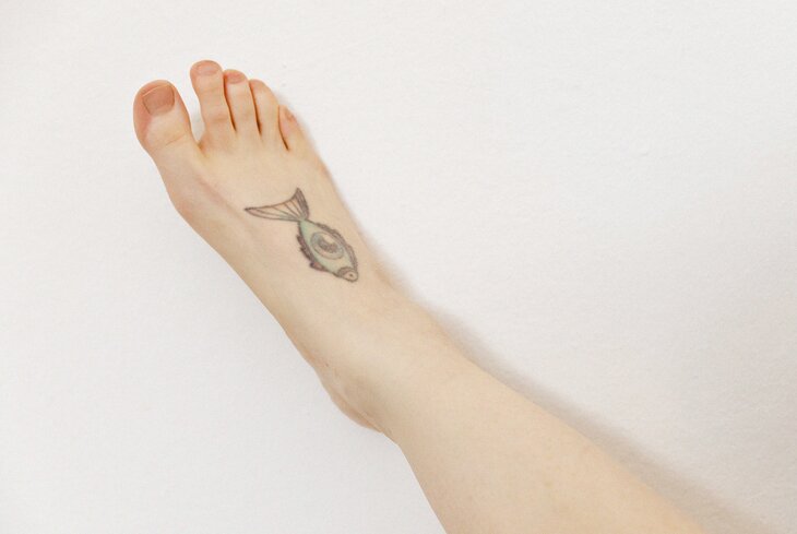 Нательные рисунки: татуировки художницы Катики
