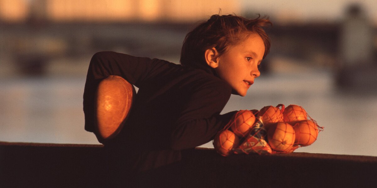 Девочка с апельсинами и город с высоты: гид по фотовыставке Николая Рахманова