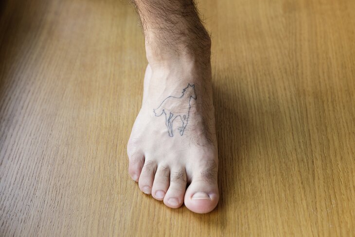 Нательные рисунки: татуировки музыканта Тима Аминова